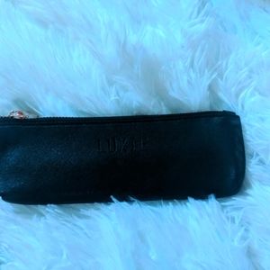 Luxie makeup brushes with case.